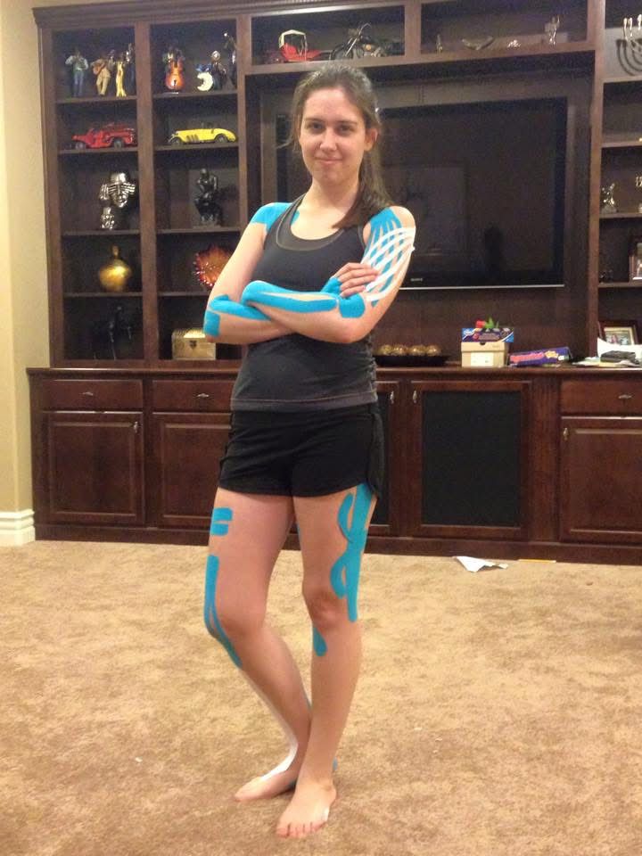 Kinesiotaping applied to the face and neck to support muscle function